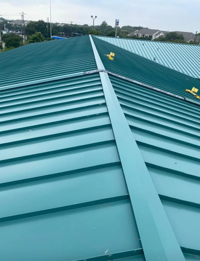 Green commercial metal roof ridge and valley for Metal Roof Repair in Ferry Pass